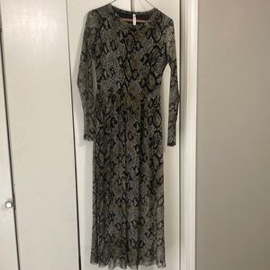 Python print mess dress. Only sleeves are see-through. Very comfortable fit.